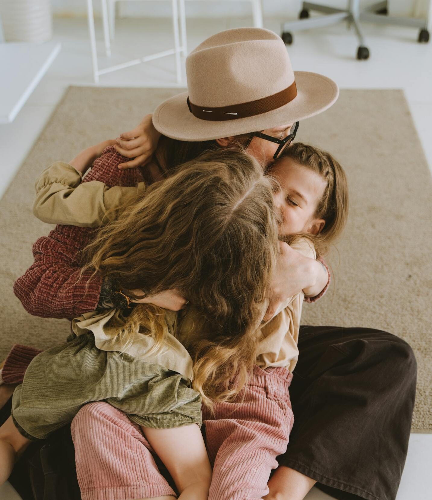 A Woman Playing with Her Daughters